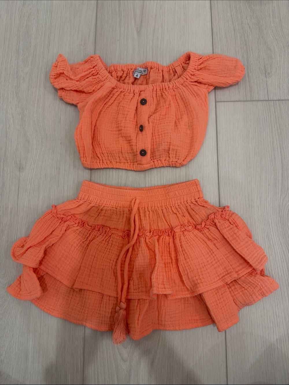 Girls Orange Ruffled Two-Piece Skirt Set - Crop Top & Tiered Skirt